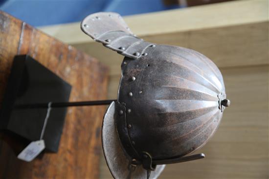 A Cromwellian lobster tail helmet,